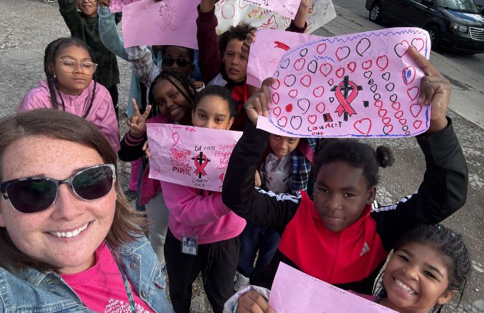 Ms. Ermoyan and her class marching in the fight against breast cancer